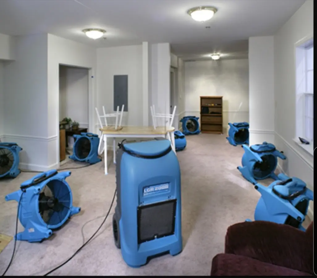 Air movers and dehumidifier setup for Water Damage Restoration in East End